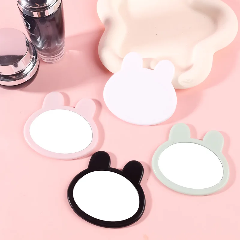 مرآة مكياج على شكل رأس أرنب مبتكرة لطيفة صغيرة محمولة باللون الوردي والأخضر والأبيض والأسود