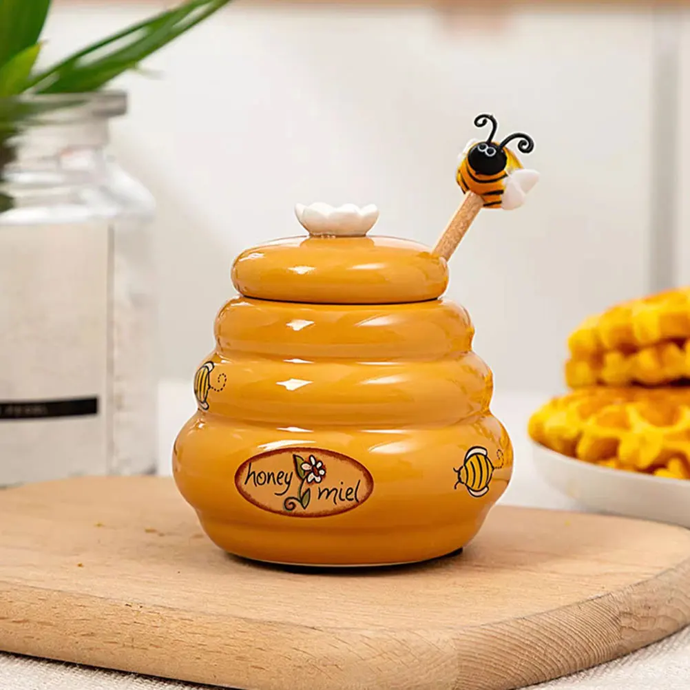 

High Quality Ceramic Honey Jar With Wooden Mixing Rod And Cover Honeycomb Tank Honey Bottle Kitchen Storage Containers