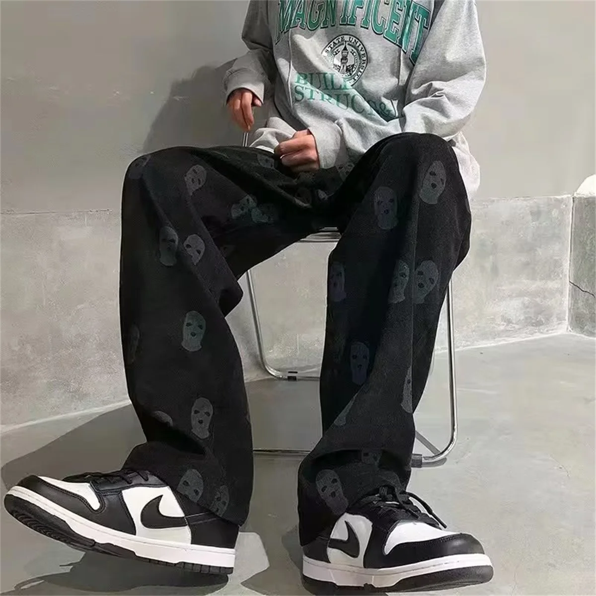 กางเกงฮิปฮอปแฟชั่นลายหัวกะโหลก สีดำ ทรงหลวม มีกระเป๋า เหมาะสำหรับกิจกรรมกลางแจ้ง ผ้ามีความยืดหยุ่น สไตล์สปอร์ต แนวสตรีท กางเกงลำลองสไตล์โกธิค สำหรับผู้ชาย