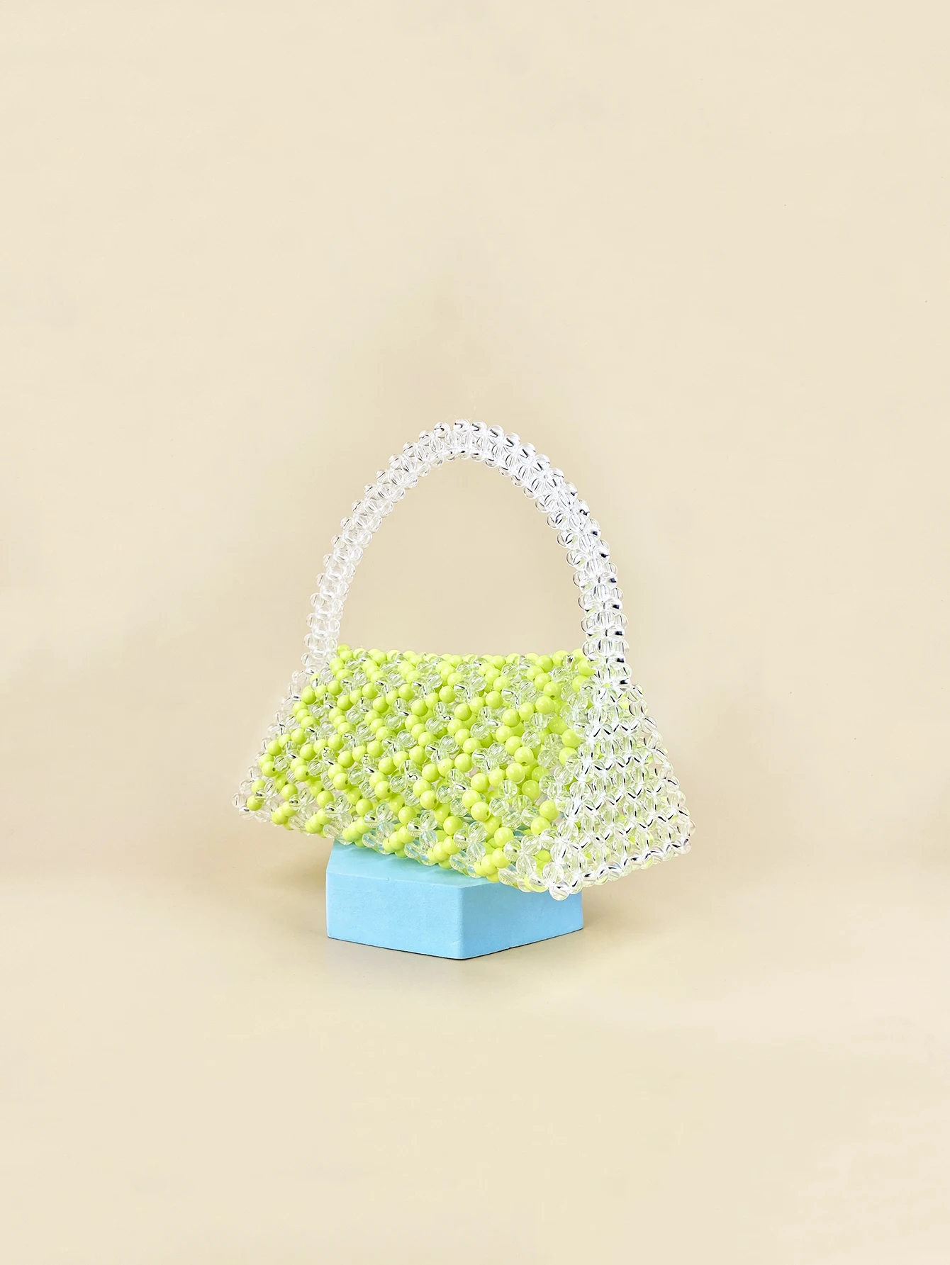 Creative design of European and American fresh candy colored handmade beaded handbag with a cover style triangle bag