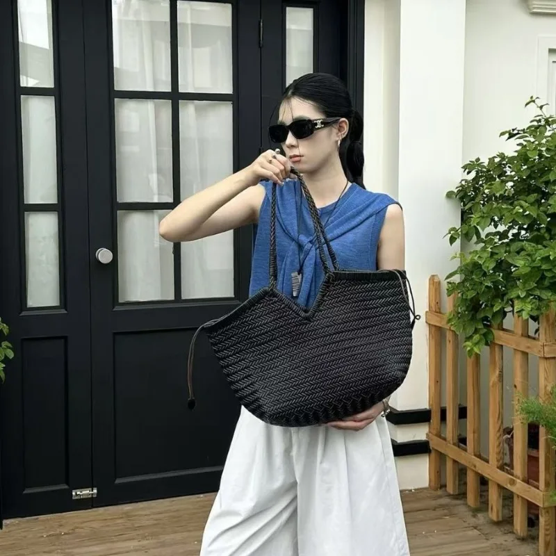 customized cowhide hand woven vegetable basket bag, large capacity vacation style tote bag performance showcase