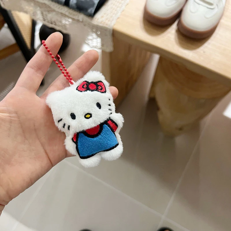 Jouet en peluche de dessin animé pour hommes et femmes, pendentif chaton, beurre KT classique, sac à dos, accessoires de sac de voyage