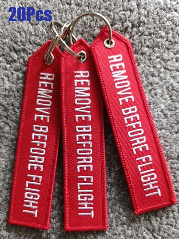 20Pcs Red Remove Before Flight Keychain Tag Webbing Strap Key Ring Backpack Accessory