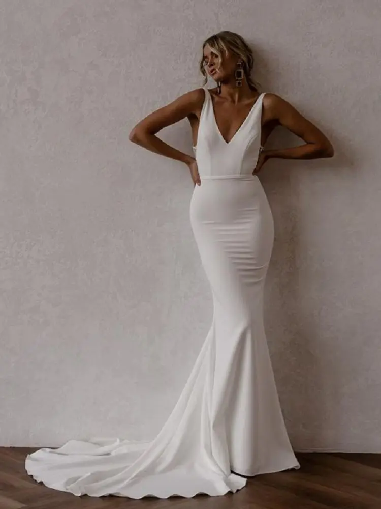 

Sexy Spaghetti Straps Mermaid Wedding Dresses 2023 V Neck Appliques Backless Pleat Robe De Mariee Tulle Court Train Bridal Gowns