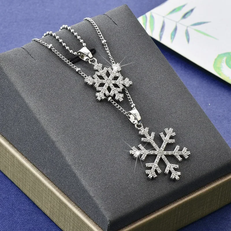 

New high-end double-layer snowflake sweater chain, long and elegant, versatile yet simple necklace pendant