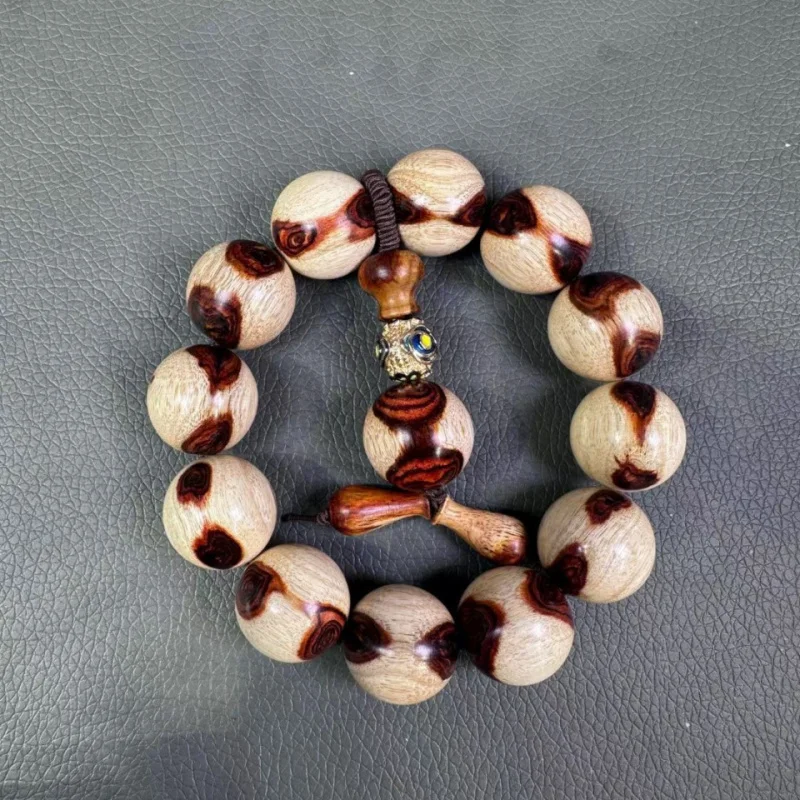 

Authentic Hainan Huanghuali Ghost Face 2.0 Bracelet for Men, Unique Eye-Patterned Buddhist Bead Gift