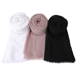 A set of 3 solid color cotton and linen crumpled scarves and shawls