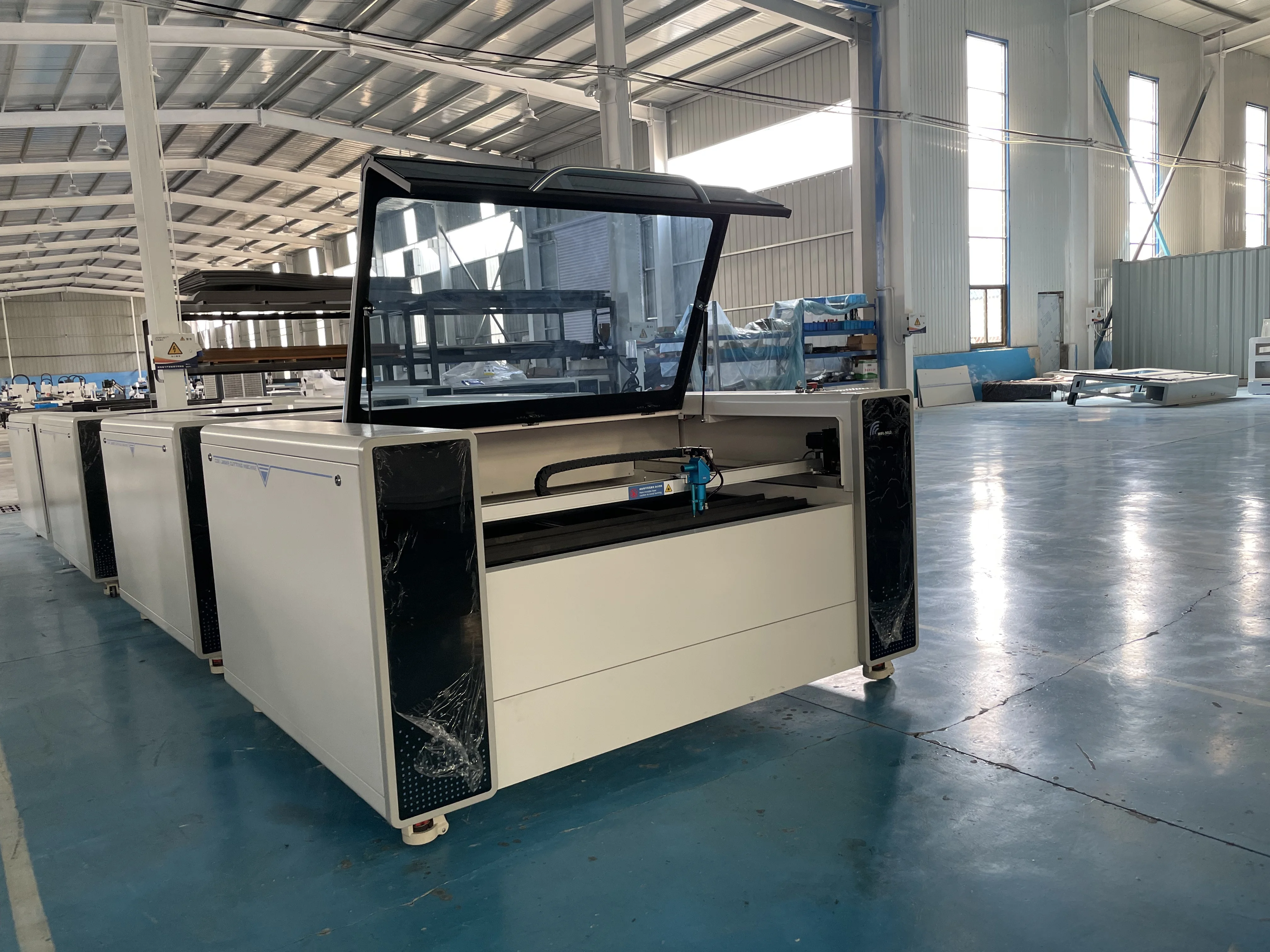 Mejor precio 1390 6090 1610 Co2 mdf máquina de grabado láser acrílico 100w 130w 150w cuero 1390 máquina cortadora láser