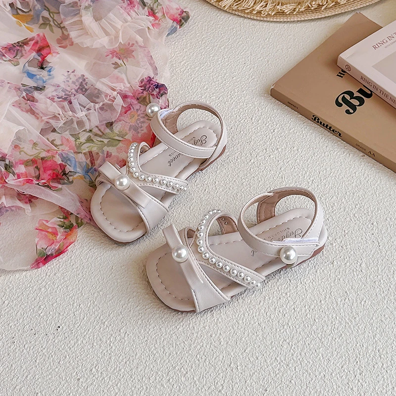 

Детские пляжные туфли JGSHOWKITO для девочек, с открытым носком, мягкие, с жемчугом, сандалии конфетных цветов, милые, новинка 2026 года, детские туфли-принцессы с бусинами