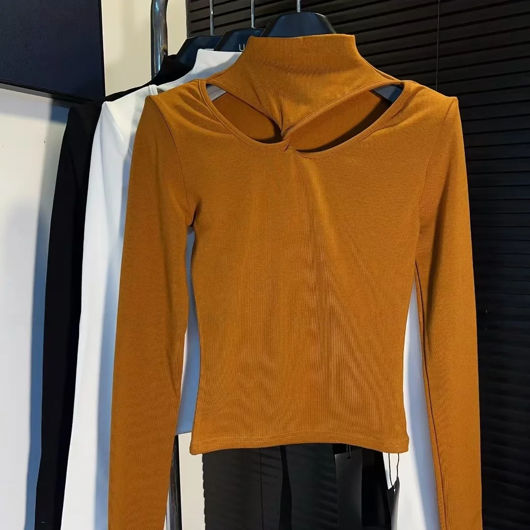 

Winter 2025 Women's ort Pure Desire Korean Sle Long Sve Floing Hollow out Design Cross Knot Warm Knitted Top