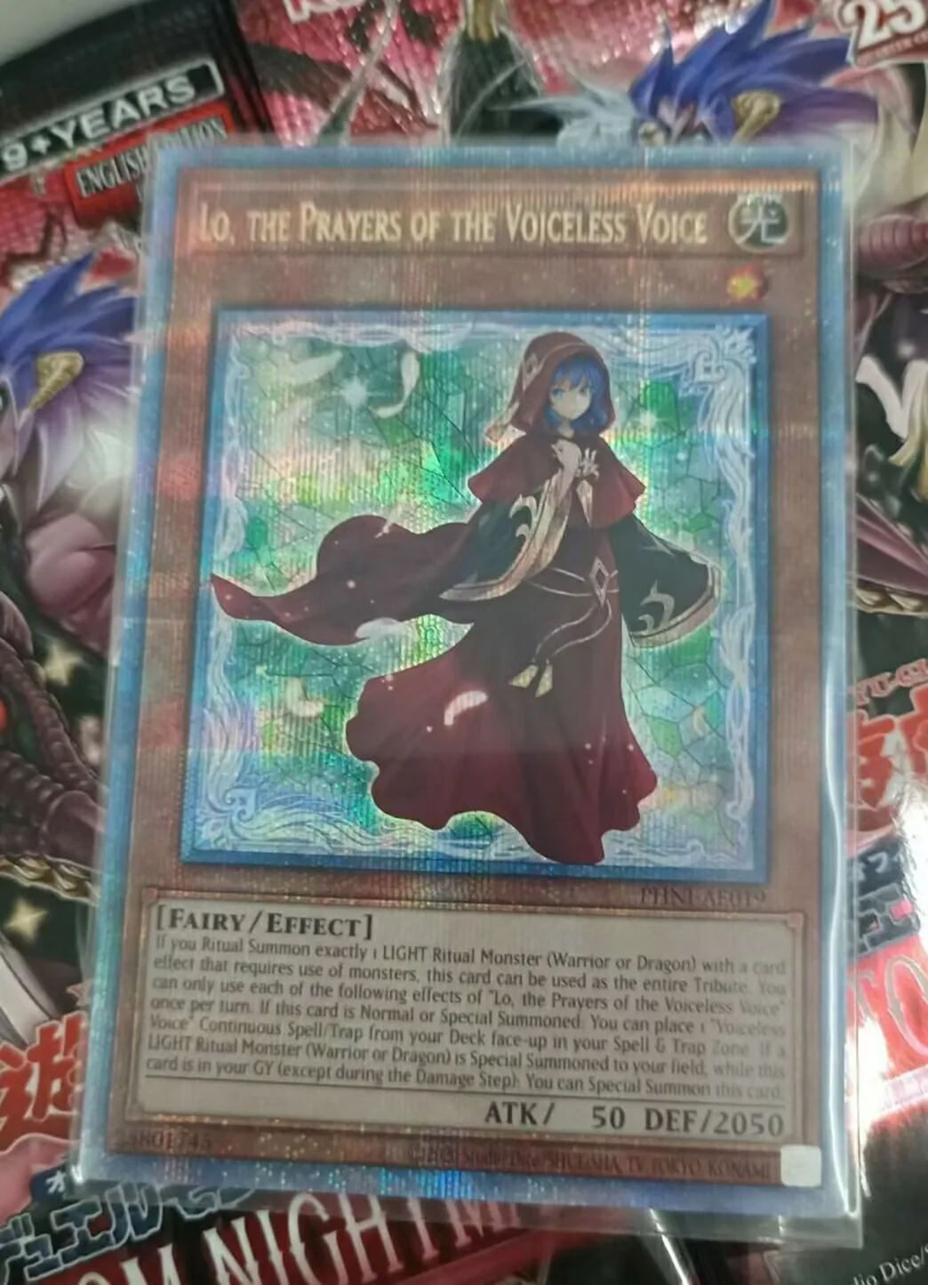 Yugioh KONAMI PHNI-AE019 Lo, the Prayers of the Voiceless Voice 25th Quarter Century Secret Asian English Collection Mint Card