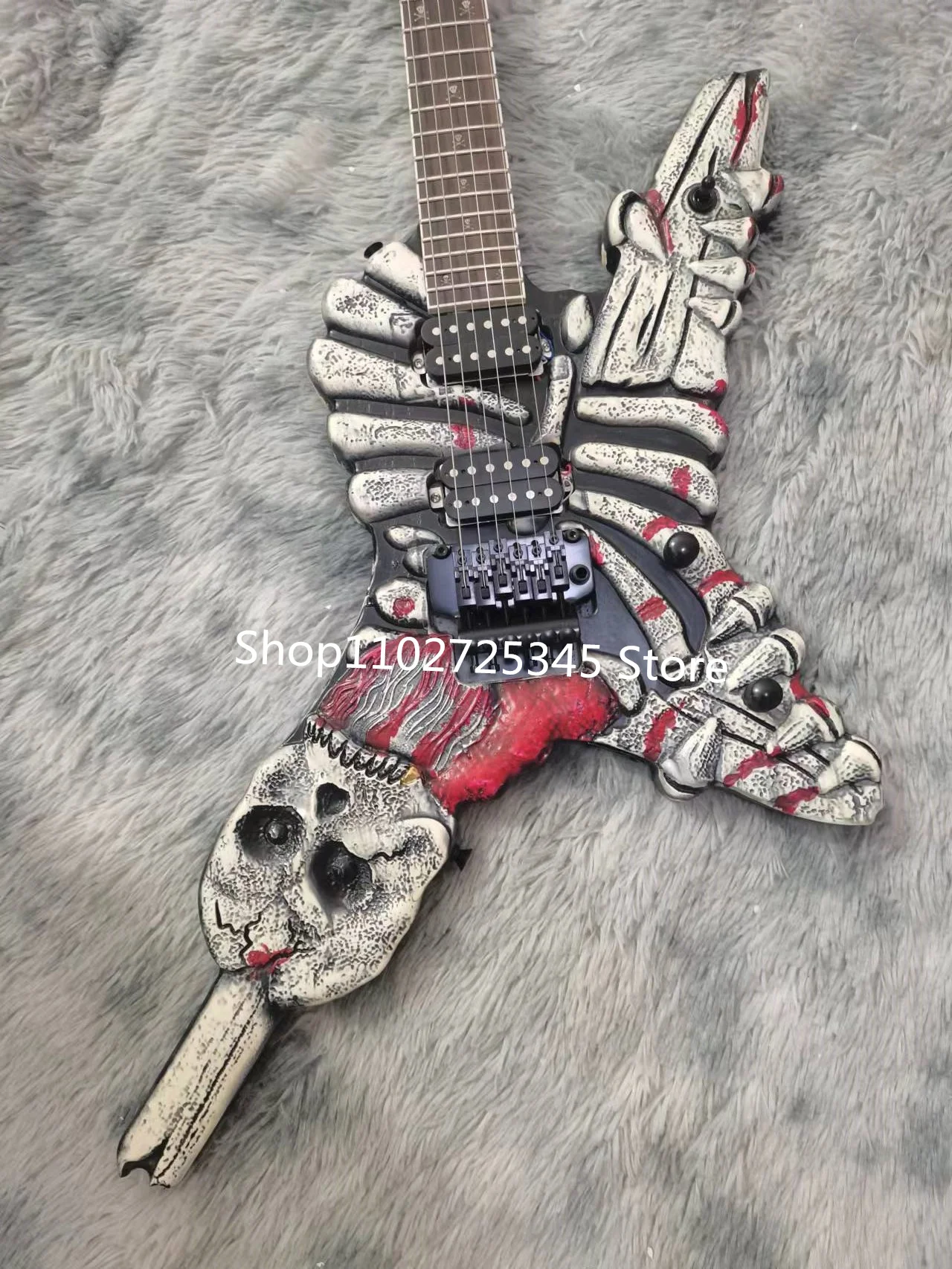 6 string skull electric guitar, black accessories, tremolo system, free shipping