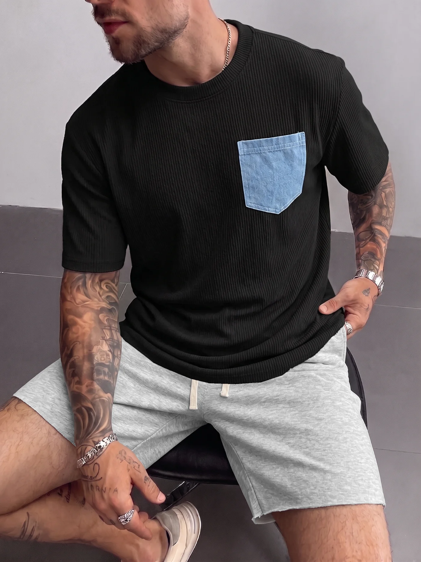 

Foreign trade waffle color contrasting pocket short sleeved set for men, loose and breathable solid color shorts two-piece set