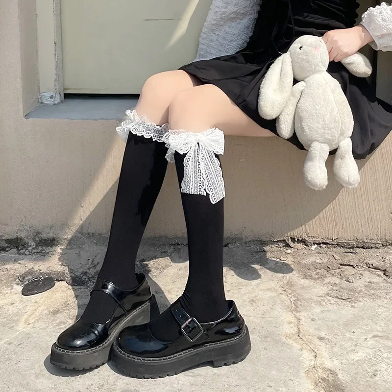 Calzini al ginocchio per ragazze dolci Calze da donna Lolita Calzini con volant in pizzo Carino Bowknot Tinta unita Calzini lunghi bianchi neri Calze da donna