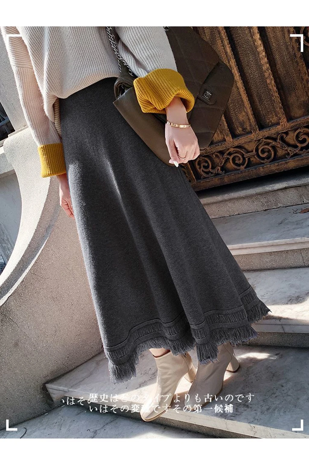 تنورة نسائية كلاسيكية للخريف جديدة بشراشيب صلبة من الصوف الكوري بخصر عالٍ مرنة متوسطة الطول تنورة محبوكة ضيقة على شكل حرف a