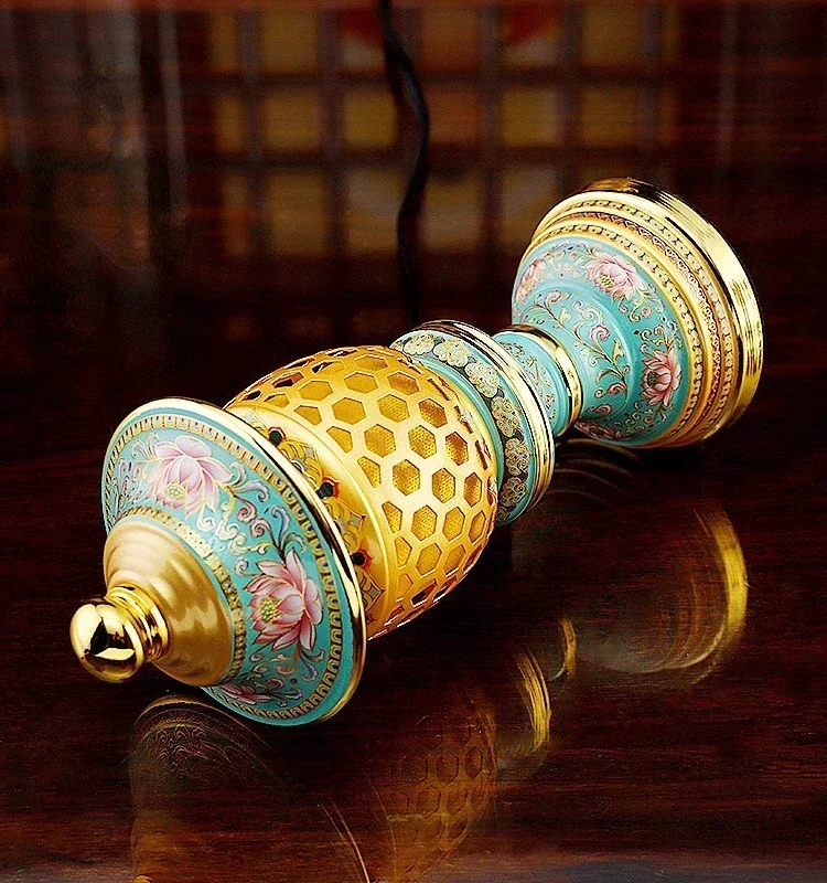 The enamel lotus led is plugged in to make money for ever-burning lamp of the god of wealth, ever-burning lamp