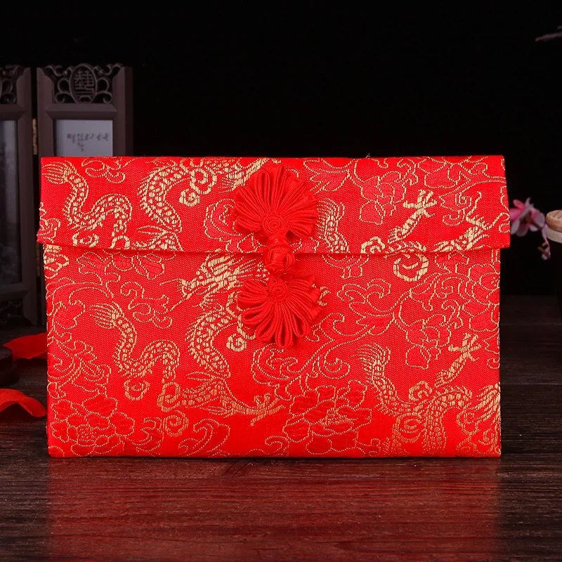 High-grade silk cloth ten thousand yuan red envelope Chinese style embroidery brocade fabric change lipstick bag profit is seal