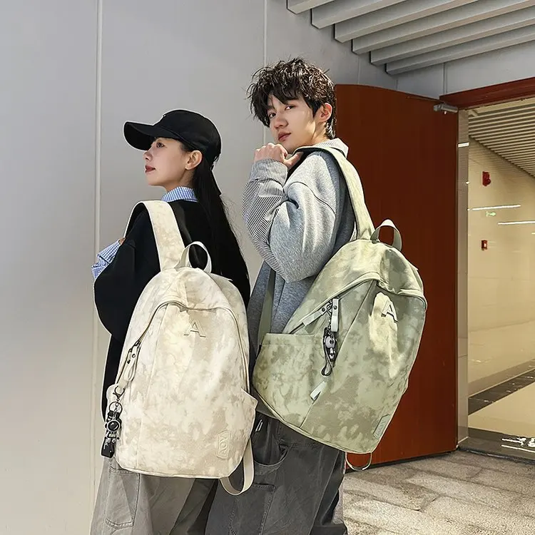 2026 New Tie Dye Backpack Unisex Large Capacity Nylon Double Shoulder Bag Outdoor Functional Style Water Resistant School Bag