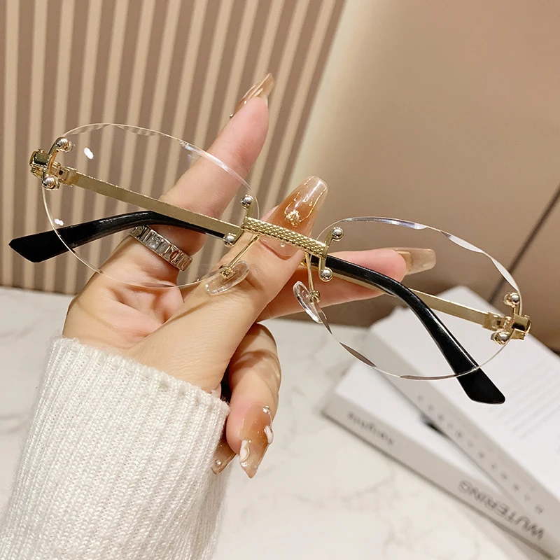 2025 безрамочные эллиптические солнцезащитные очки с обрезанными краями, модные высококачественные металлические солнцезащитные очки интернет-знаменитостей 90257