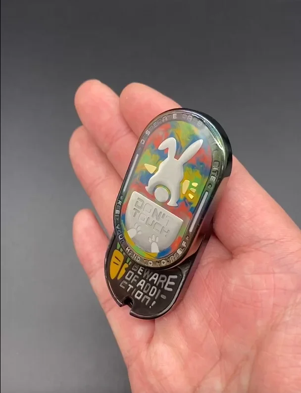 

Mot rhythmic push card zirconium colored rabbit fingertip gyroscope