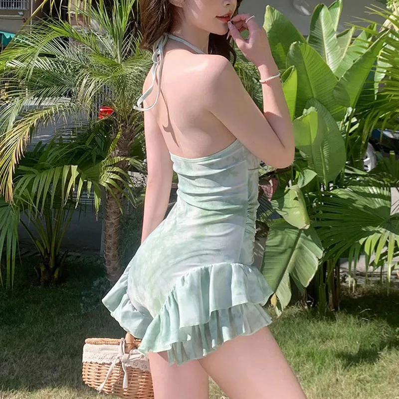 เกาหลีแฟชั่นชุดว่ายน้ําแบบอนุรักษ์นิยม One Piece พิมพ์ลายดอกไม้ย่น Ruffles ชุดมินิ Culottes บิกินี่ชุดว่ายน้ําเบาะ