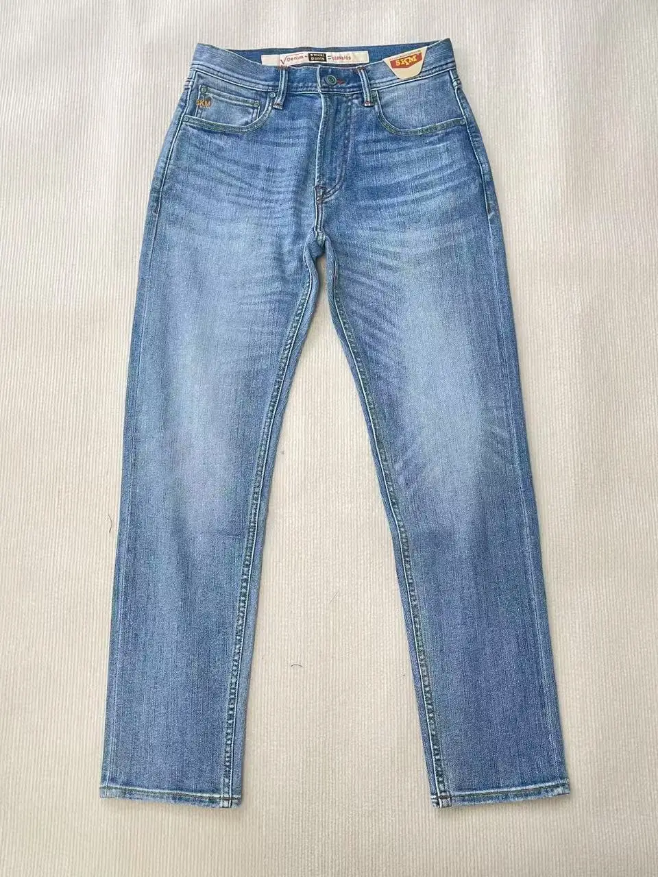 ฤดูร้อนน้ําหนักเบา 11oz สีแดง Selvedge DENIM Magnolia กางเกงยีนส์อินเทรนด์ผ้าฝ้าย 99% ล้างยืด Slim Tapered Fit กางเกงผู้ชาย 5KM