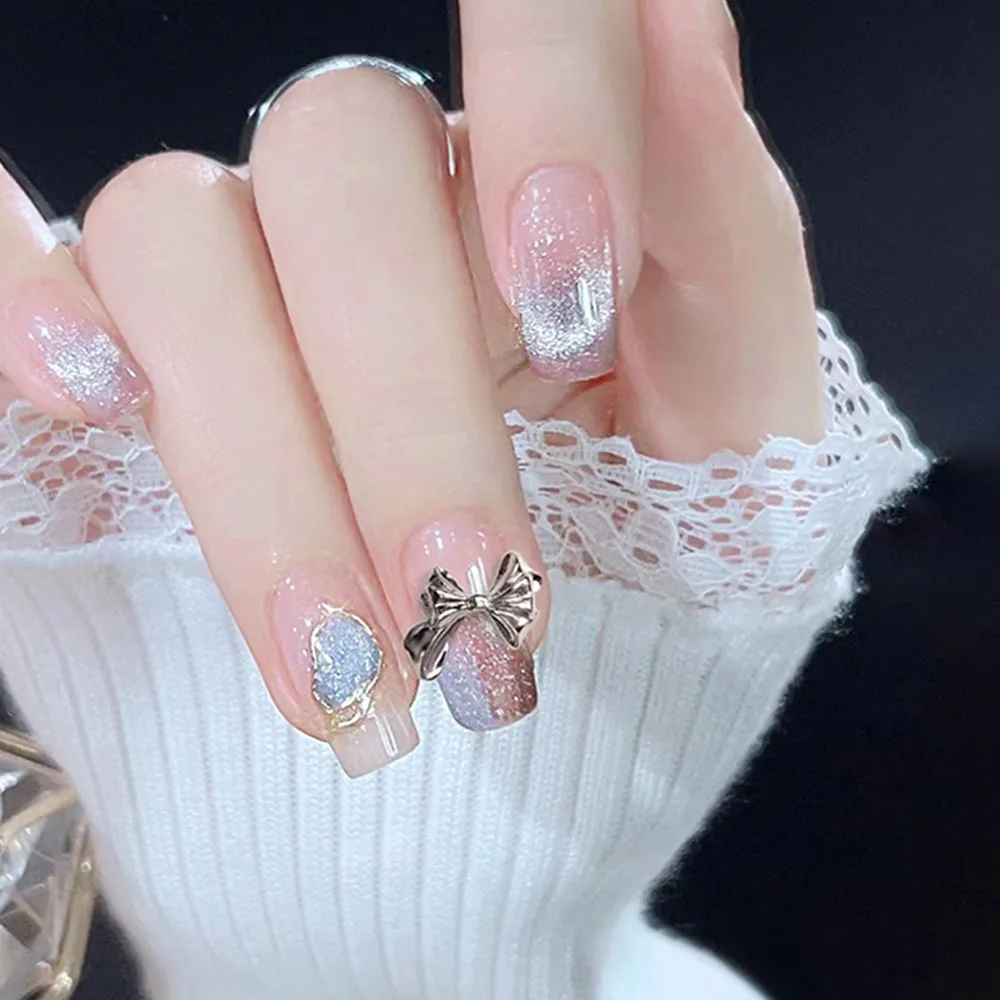 10 Uds. De pajarita plateada Retro de Metal para decoración de uñas, joyería torcida de aleación 3D, dijes para uñas, suministros de accesorios de manicura exquisitos DIY