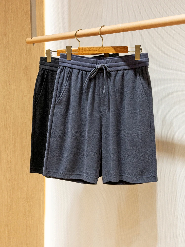 

Мужские летние спортивные шорты из хлопковой ткани с эластичным поясом и завязками, изготовленные на заказ.