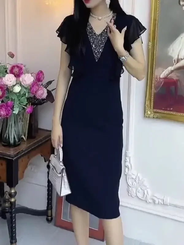 V-neck ruffled sleeve black dress female summer new plus size high-end exquisite slim fashion temperament beaded hip skirt.