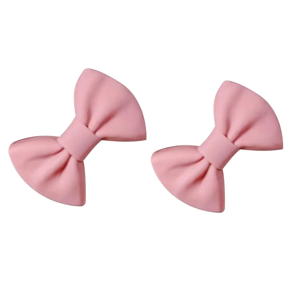 2PCS New Silicone Heat Insulator Clip Bow Tie Shape Mini Pot Handle Cover Pinch Grip Heat Resistant Oven Mitt Home Kitchen view 4