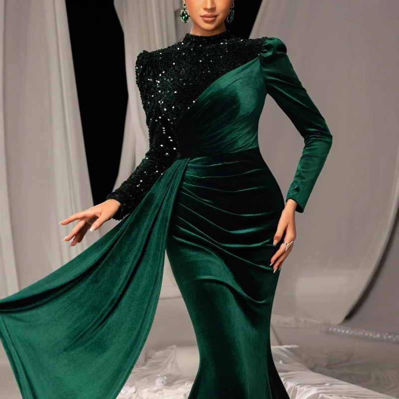 Elegant long green evening gown a classy lady hosting a company's annual party