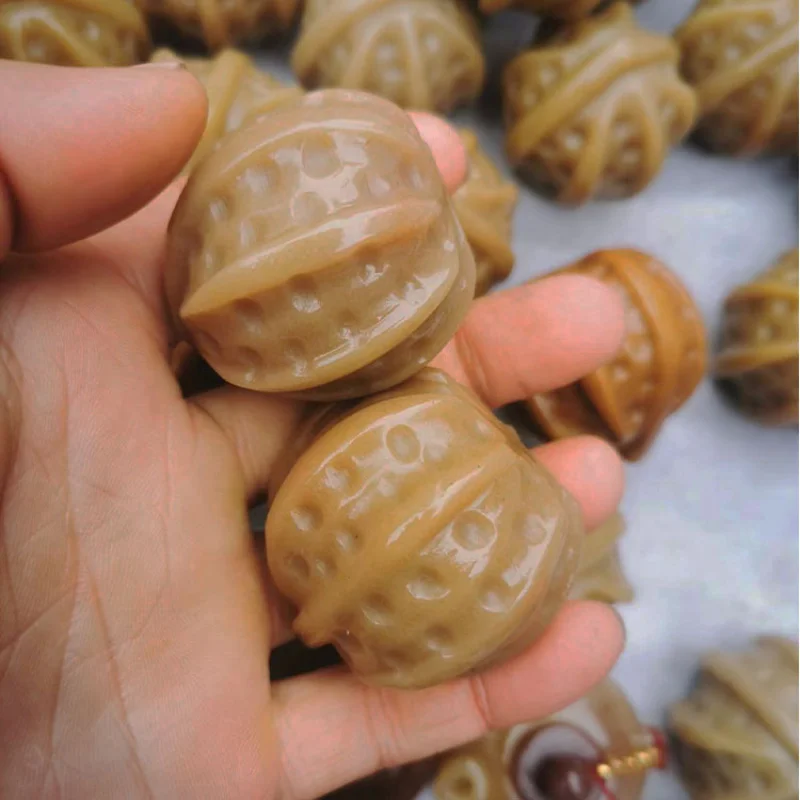 

Gobi Golden Silk Jade Handheld Ornament, Handmade Walnut, Fashionable and Versatile