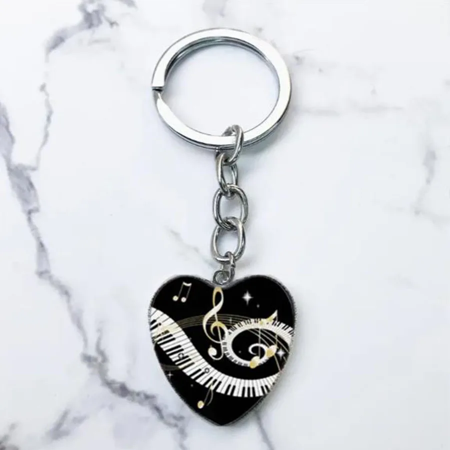 Heart shaped piano keychain paired with a glass alloy pendant is the perfect gift for music enthusiasts and musicians