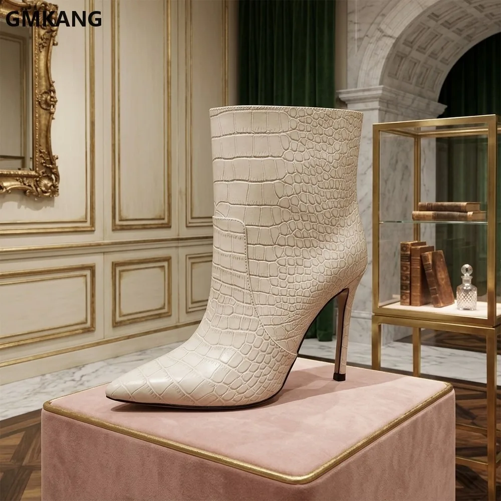 Here is the optimized product title based on your requirements:**Women's Genuine Leather Pointed Toe Stiletto Ankle Boots