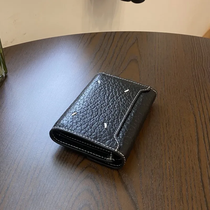 2025 Women's Cowhide Short Three-fold Wallet European American and Korean Version Folding Small Change Multi-purpose Wallet