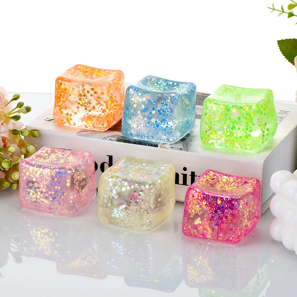 

Антистрессовая игрушка-кубик из ТПР с медленным восстановлением формы, в виде маленьких кубиков льда, разноцветная, в стиле полярного сияния.
