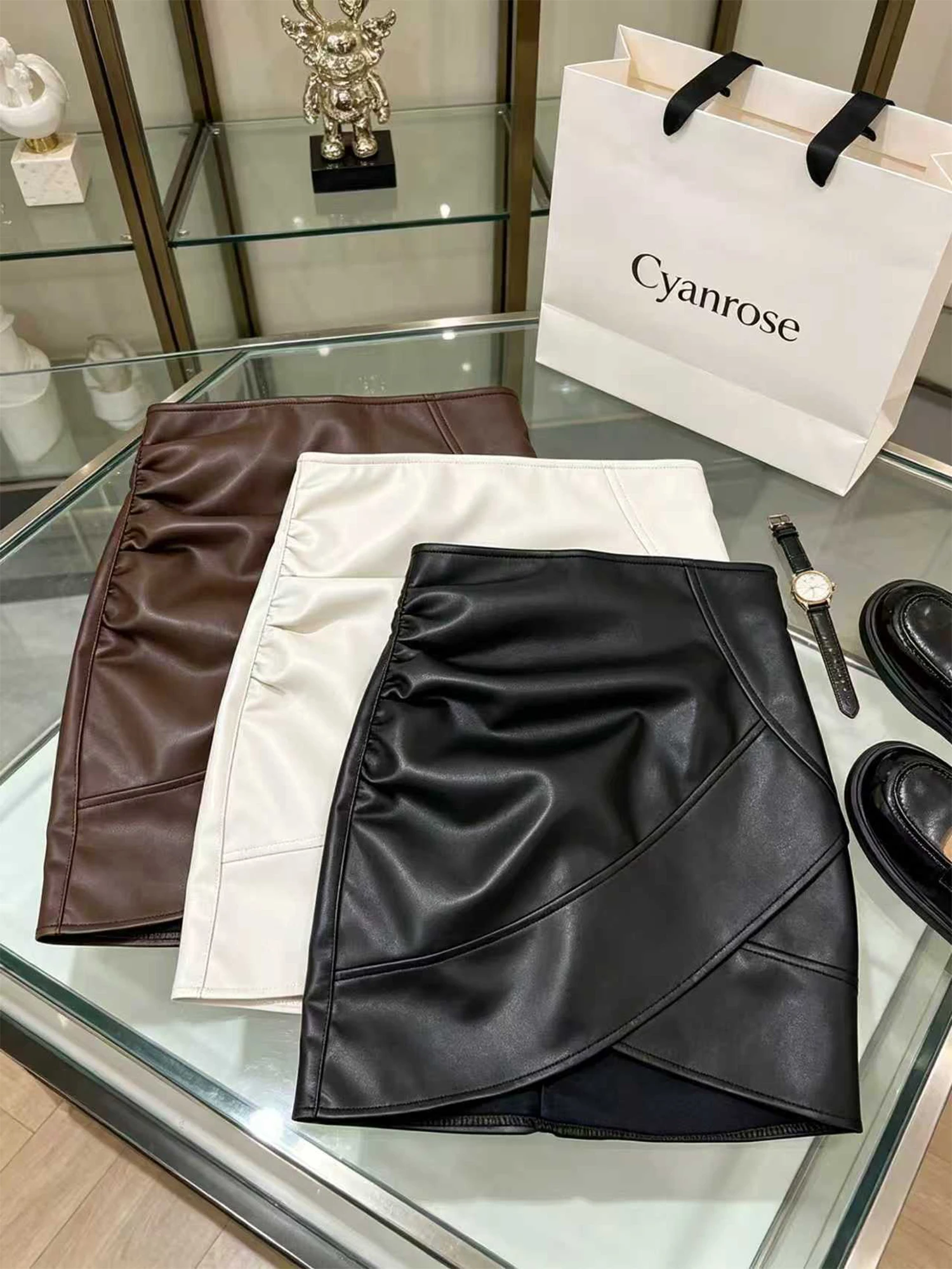 

Women Black PU Leather Midi Skirt Y2K Gyaru Short Skirt Vintage Irregular High Waist Mini A-line Bodycon Skirt for Women Summer