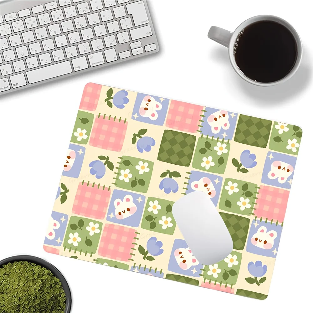 

Mousepad has a sewn edge anti-slip rubber base with a light color floral and rabbit collage pattern suitable for offices homes