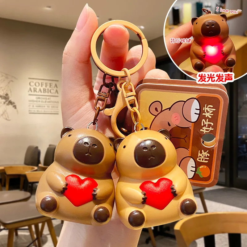 520การ์ตูนน่ารัก capybara Hug Love with Light Sound keychain ของเล่นเปล่งที่ห้อยไฟ