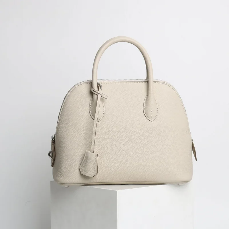 High Quality Top Layer Cowhide Design Shell Bag with Lock Cowhide Handbag Fashion Mini Crossbody Bowling Women\'s elegant bags