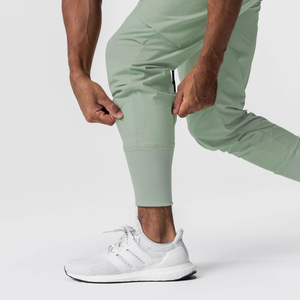 Pantaloni sportivi da uomo pantaloni Cargo da pista da palestra in Nylon pantaloni da jogging allenamento traspirante Fitness pantaloni da corsa