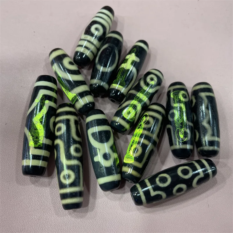 

Green Guanyin Bead Nine- Dzi Three- Two-Eyed Old Agate