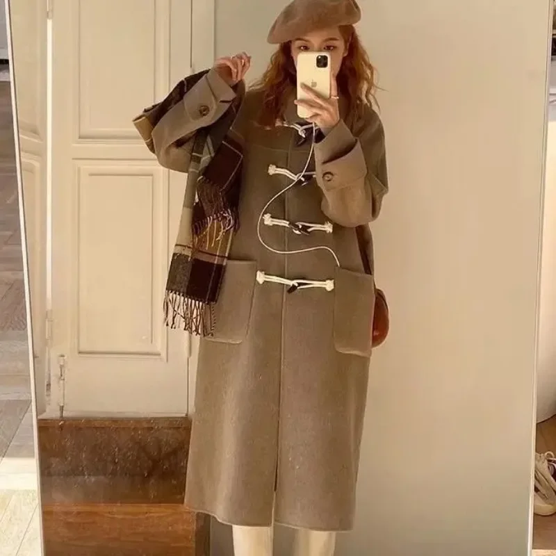 Cappotto di lana donna studente versione coreana sciolto moda corno di mucca bottone di media lunghezza addensato cappotto donna autunno e inverno