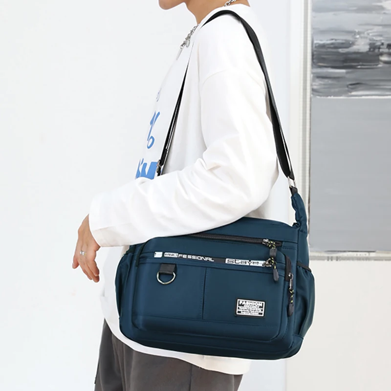 Wasserdichte Umhängetasche für Herren aus Nylon, mit mehreren Reißverschlusstaschen, großem Fassungsvermögen, als lässige Messenger-Tasche verwendbar, verstellbarer Riemen für den täglichen Gebrauch. – Detail 12