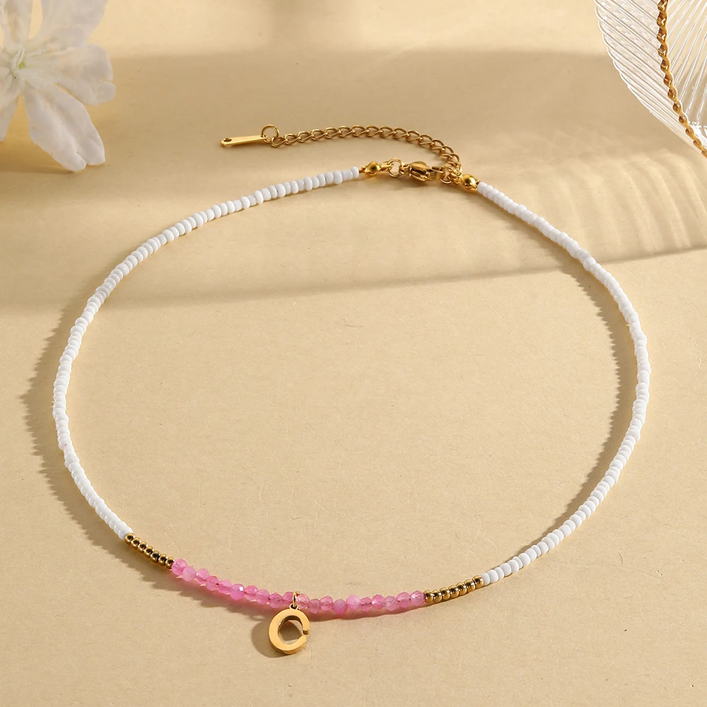 Bohemian style 26 letter pendant women\'s white rice bead pink crystal bead necklace fashionable and simple jewelry gift 2025