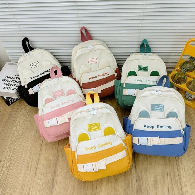 

New cute embroidered letter backpack for kindergarten children, lightweight outdoor backpack for boys and girls, student backpac