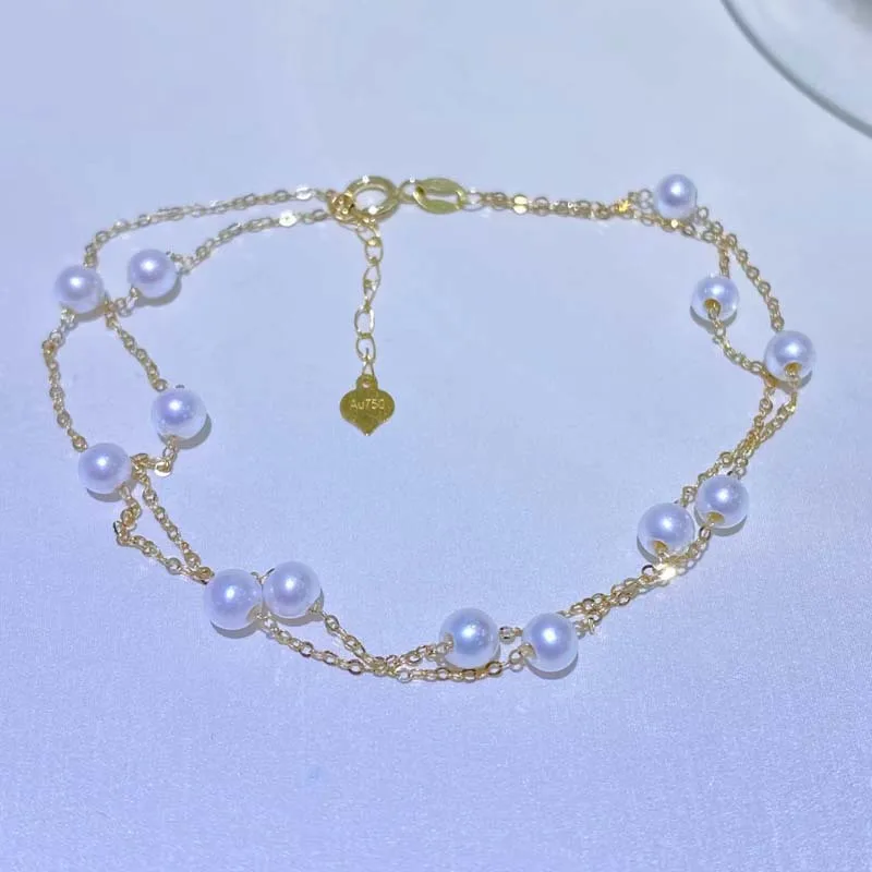 

Двухслойный браслет из 18-каратного золота с жемчугом Stardust - натуральный круглый блестящий пресноводный жемчуг диаметром 3-4 мм, ювелирные изделия