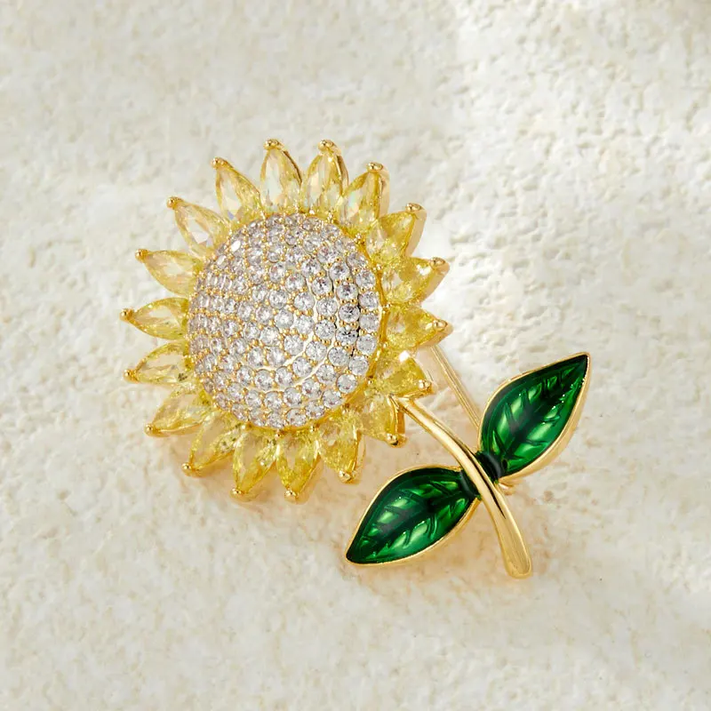 New model wins first place with sunflower brooch