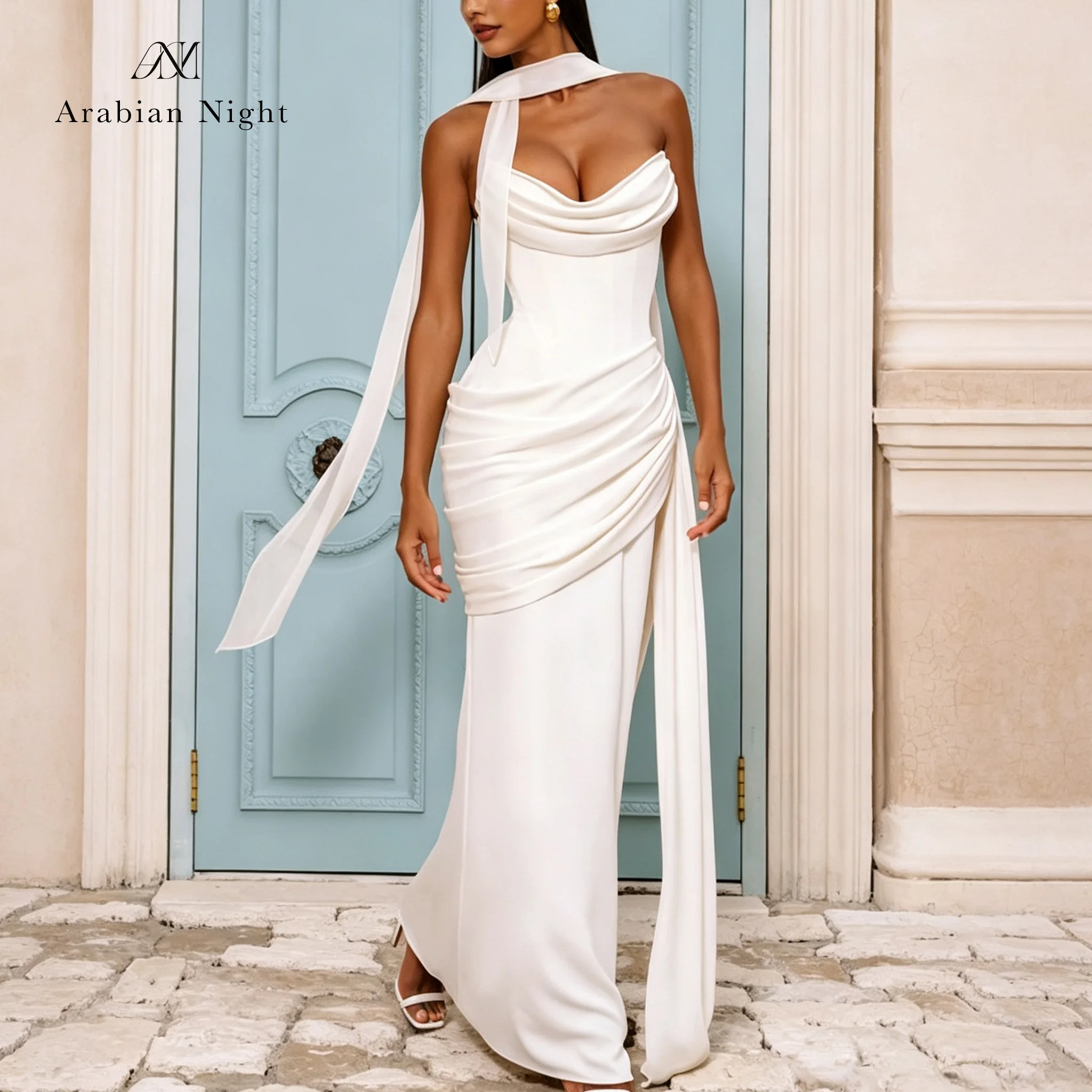 White satin strapless sleeveless fishtail floor-length formal evening dress with a necktie ribbon and pleated skirt