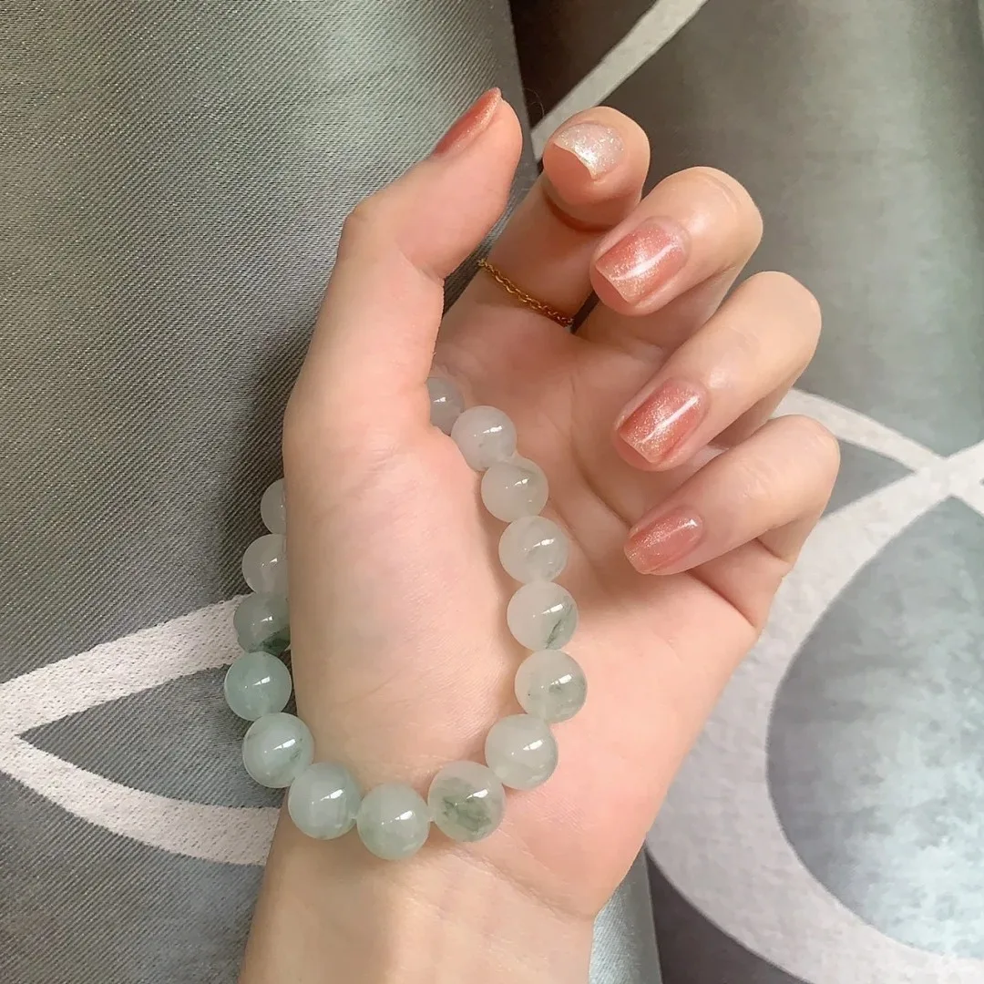 

Tianshan Cui bracelet women's jade natural white jade round bead flower bracelet.